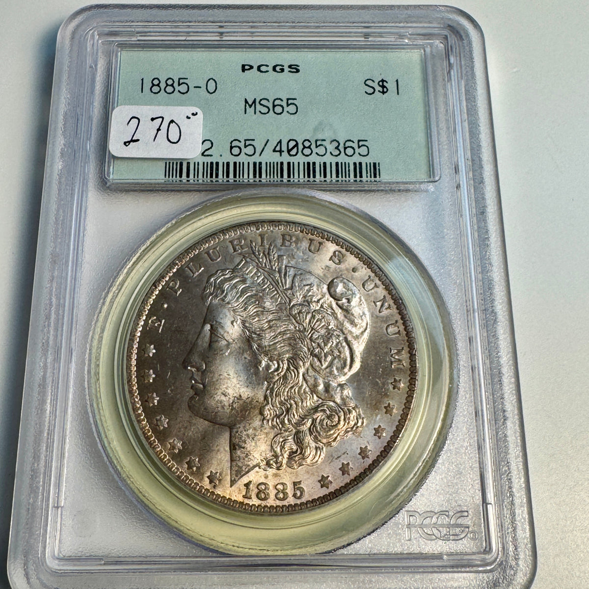 1885-O Morgan Silver Dollar, OGH PCGS MS-65