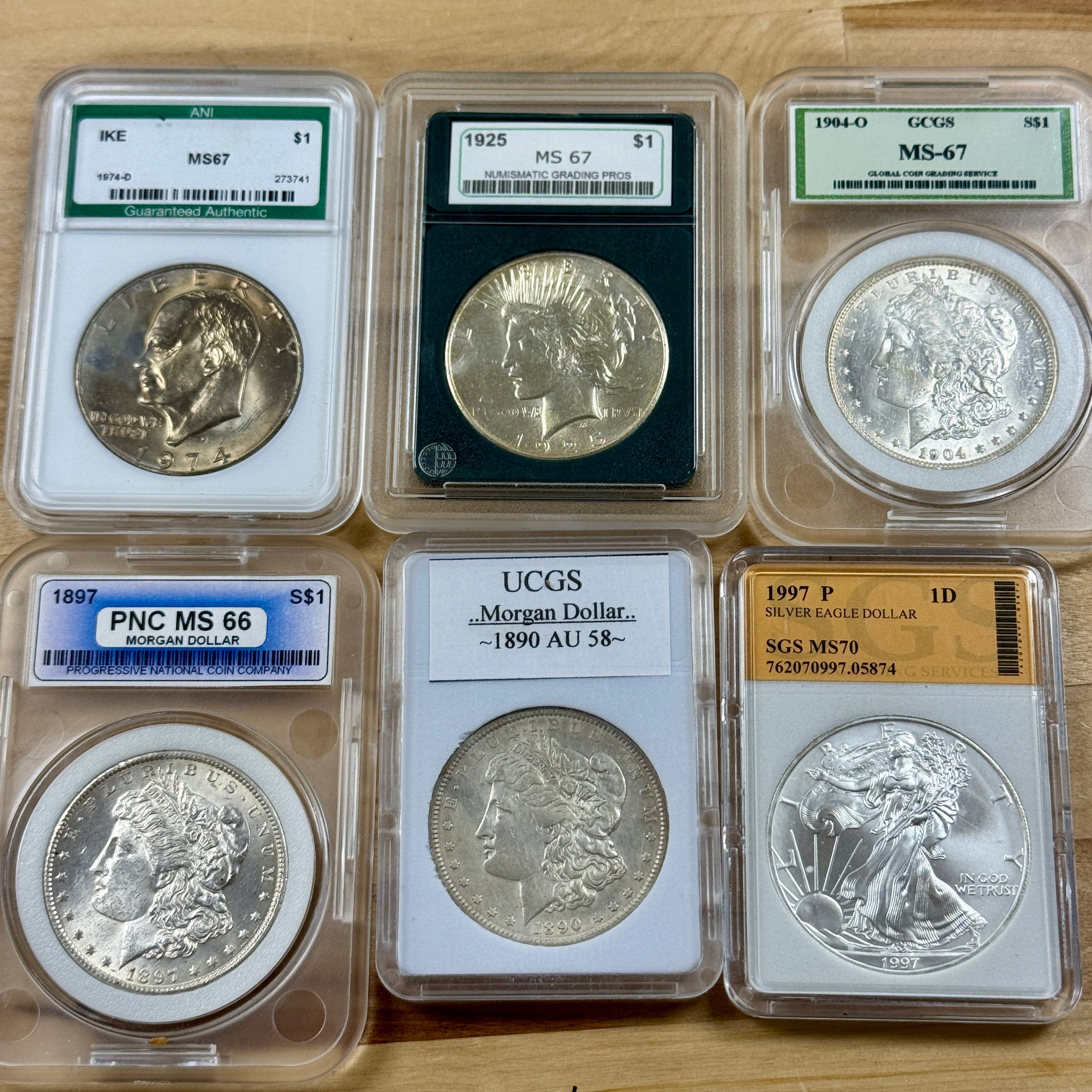 Lot of 6 x “Off-Brand” Slabs - (3) Morgan Dollar, (1) Peace Dollar, (1) ASE 1oz, (1) Eisenhower $1