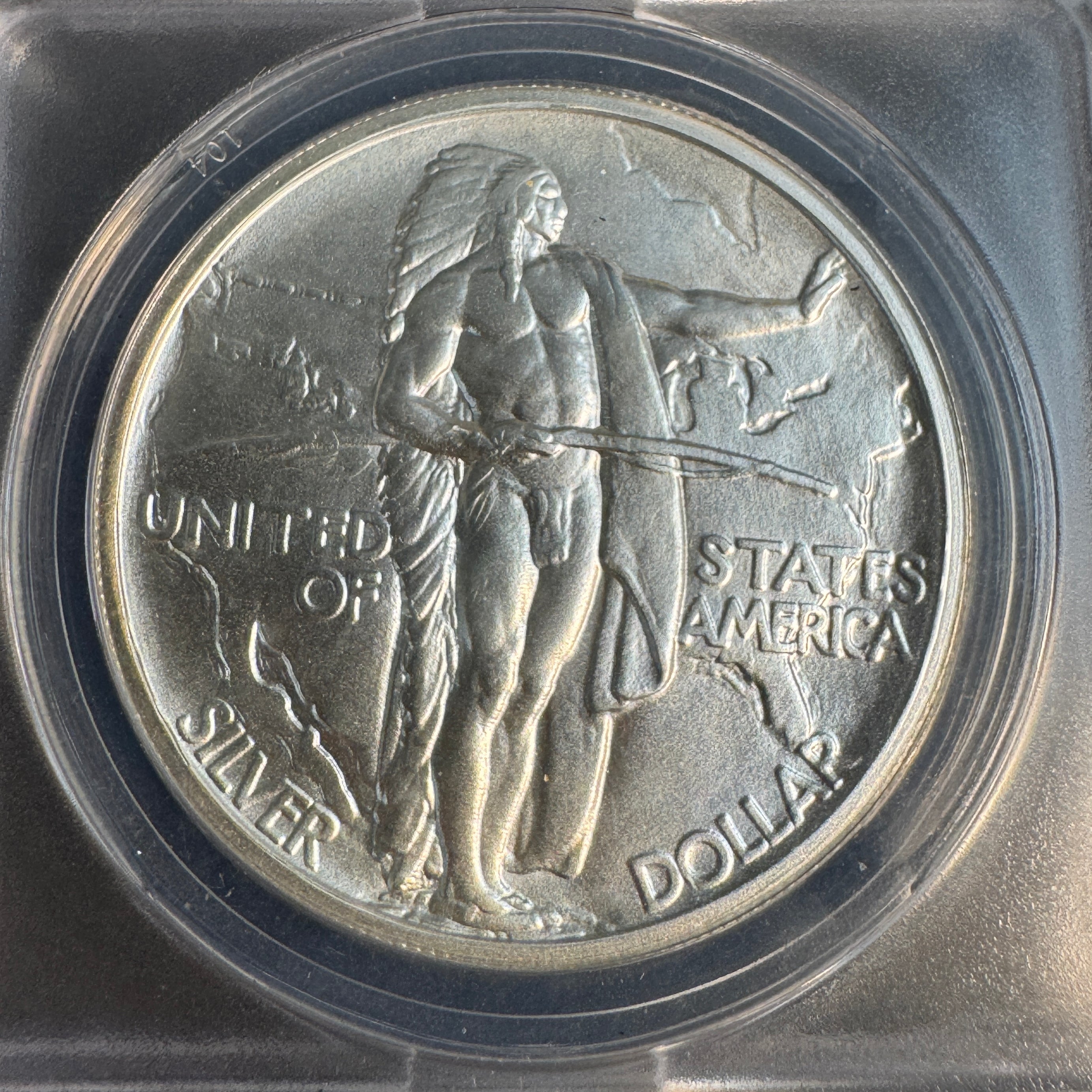 “1848” Daniel Carr Oregon Trail O/S on 1oz US Silver Eagle Host, ANACS MS-69
