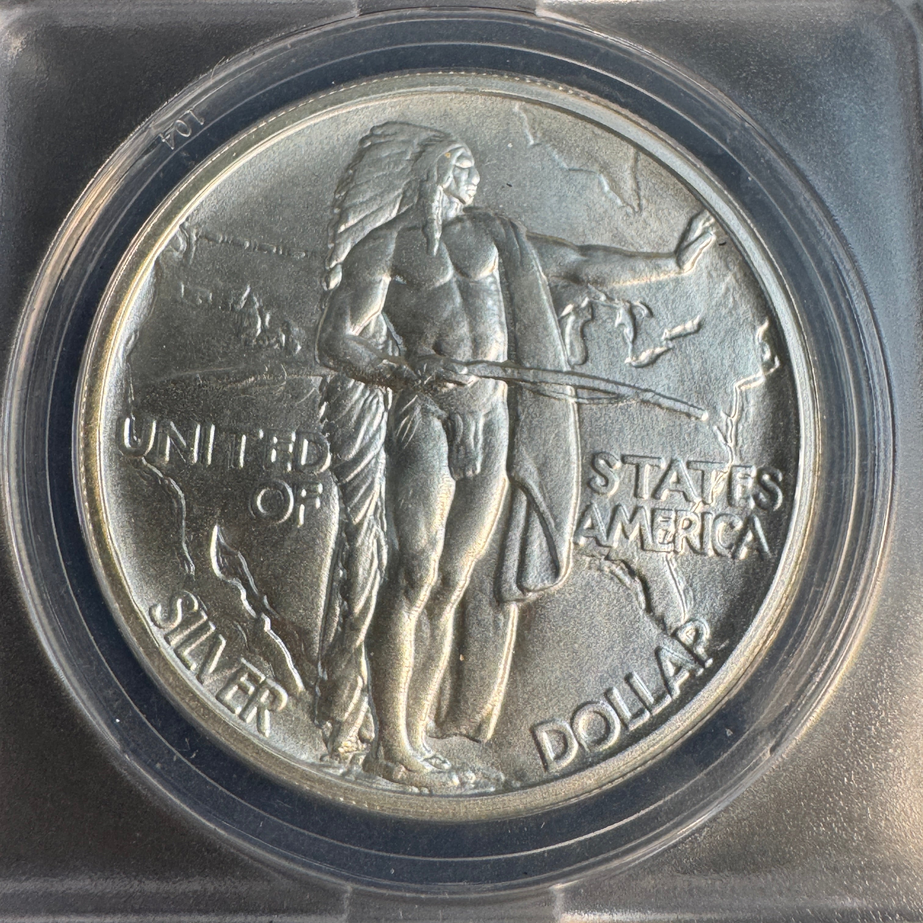 “1848” Daniel Carr Oregon Trail O/S on 1oz US Silver Eagle Host, ANACS MS-69