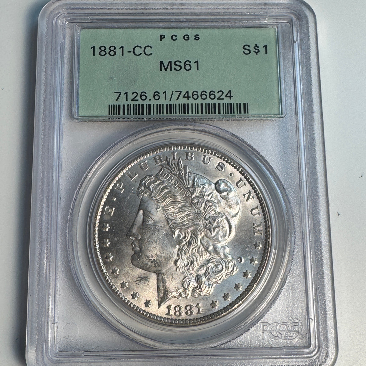 1881-CC Morgan Silver Dollar, OGH PCGS MS-61