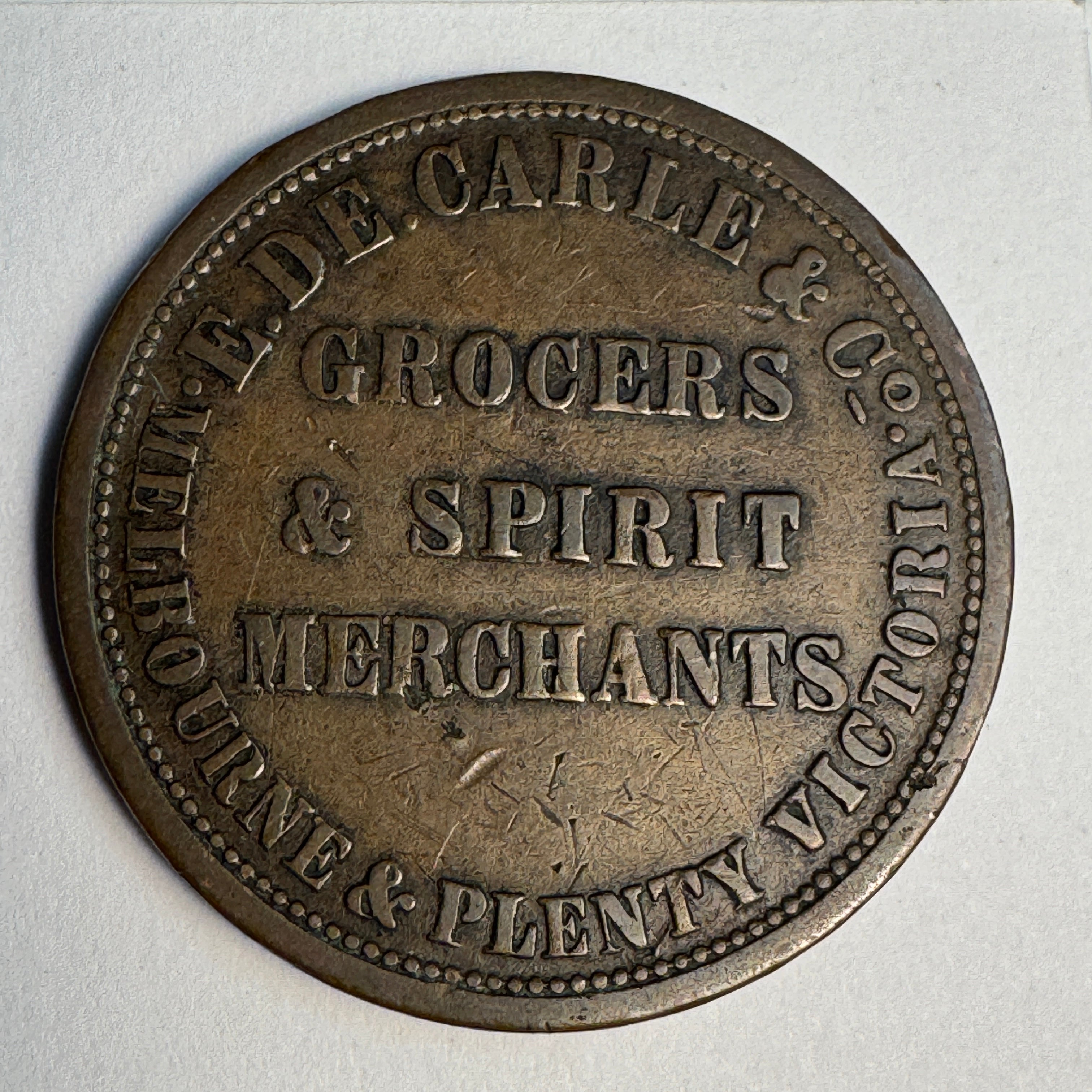 c1800’s E. De. Carle & Co., Grocers & Spirit Merchants, Melbourne & Plenty Victoria (Australia), Britannia obverse