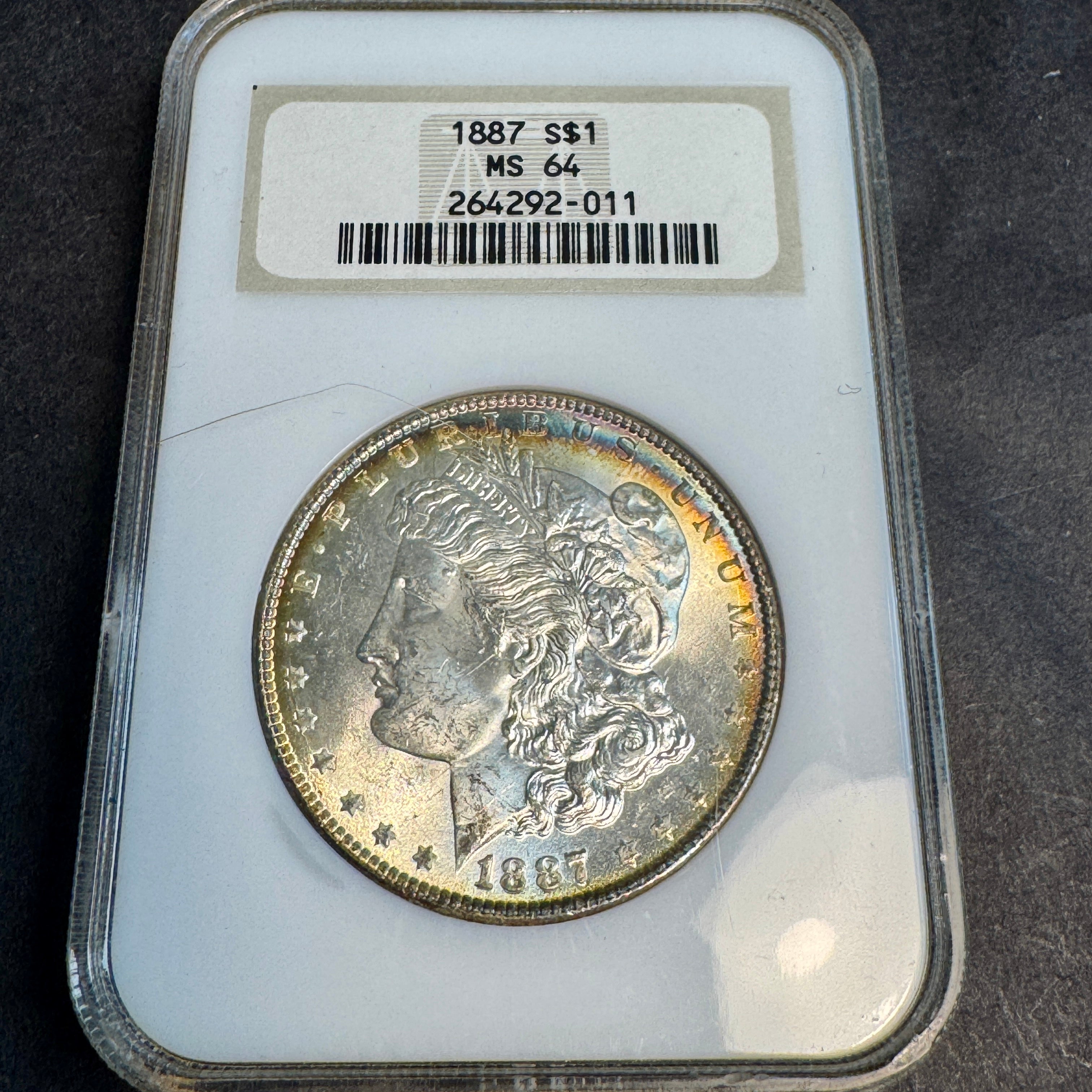 1887 Morgan Silver Dollar US$1, Fatty NGC MS-64 vibrant edge toning