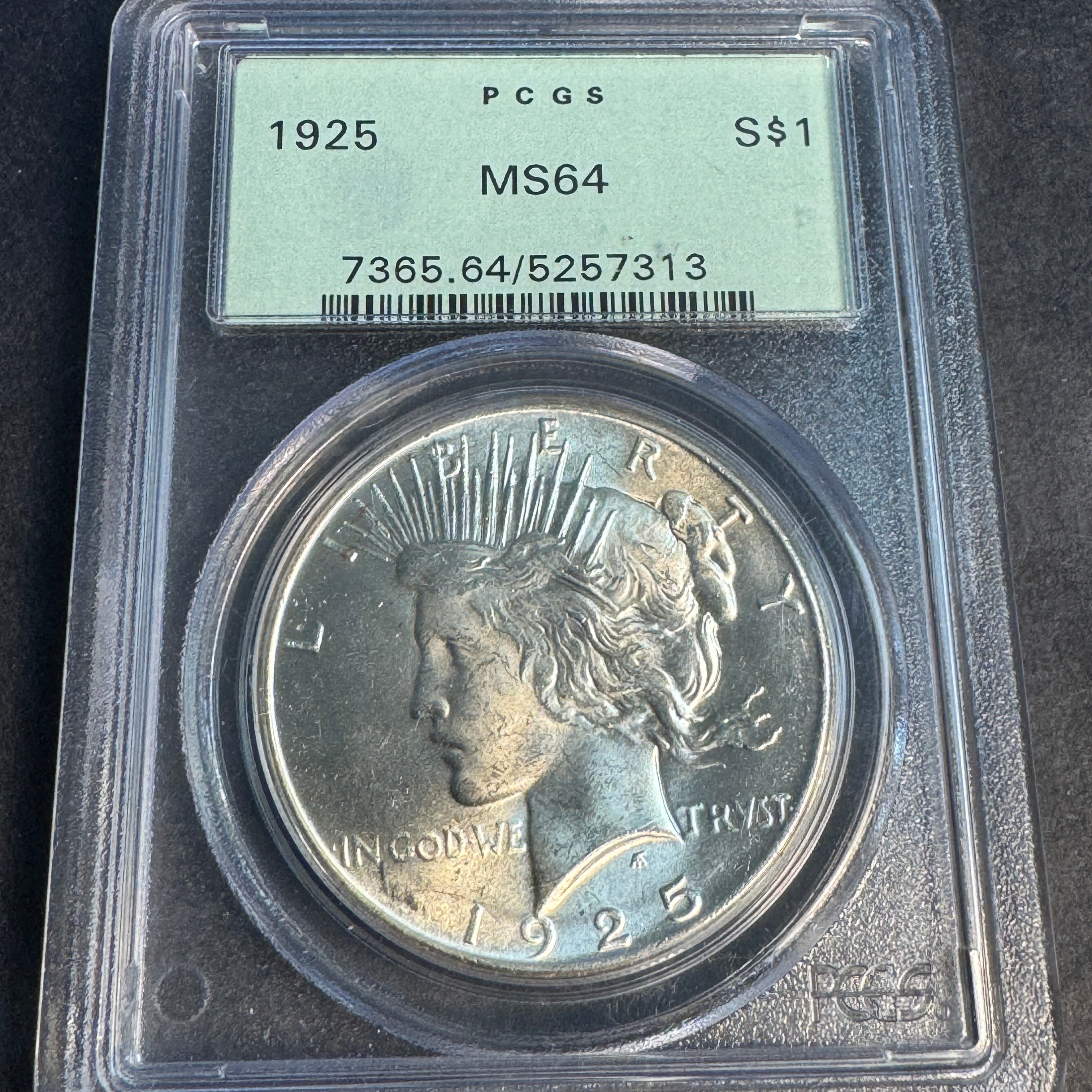 1925 (P) Peace Silver Dollar, “Old Green” PCGS MS-64
