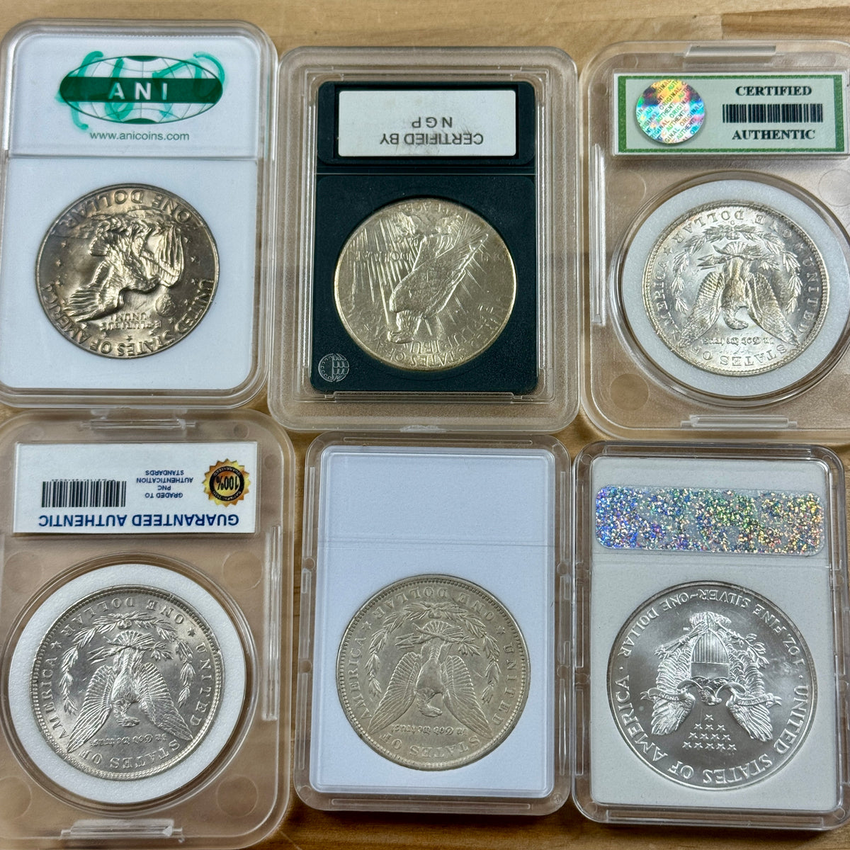 Lot of 6 x “Off-Brand” Slabs - (3) Morgan Dollar, (1) Peace Dollar, (1) ASE 1oz, (1) Eisenhower $1