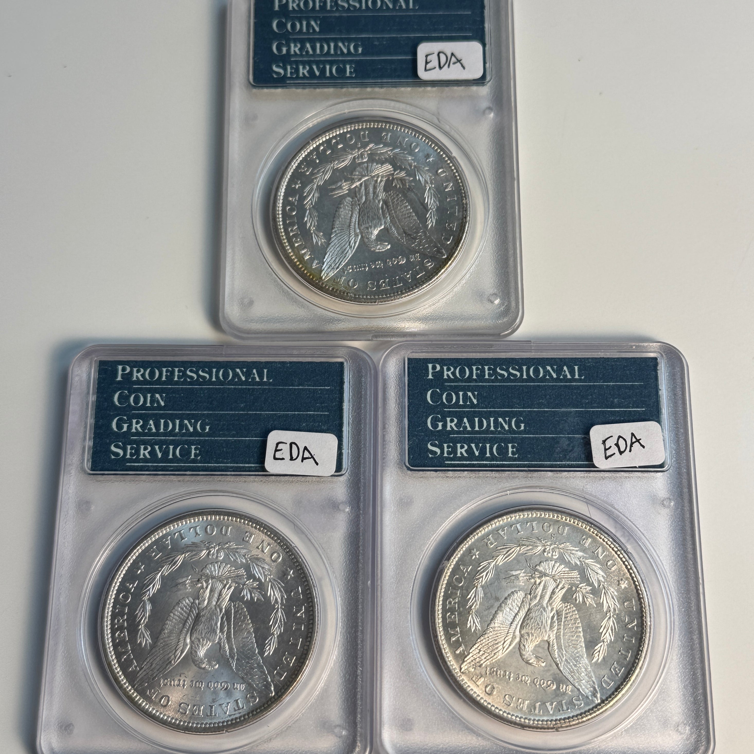 Trio of Consecutive Serial# PCGS Rattler Morgans: 1879-S MS62, 1880-S MS63, 1881 MS62