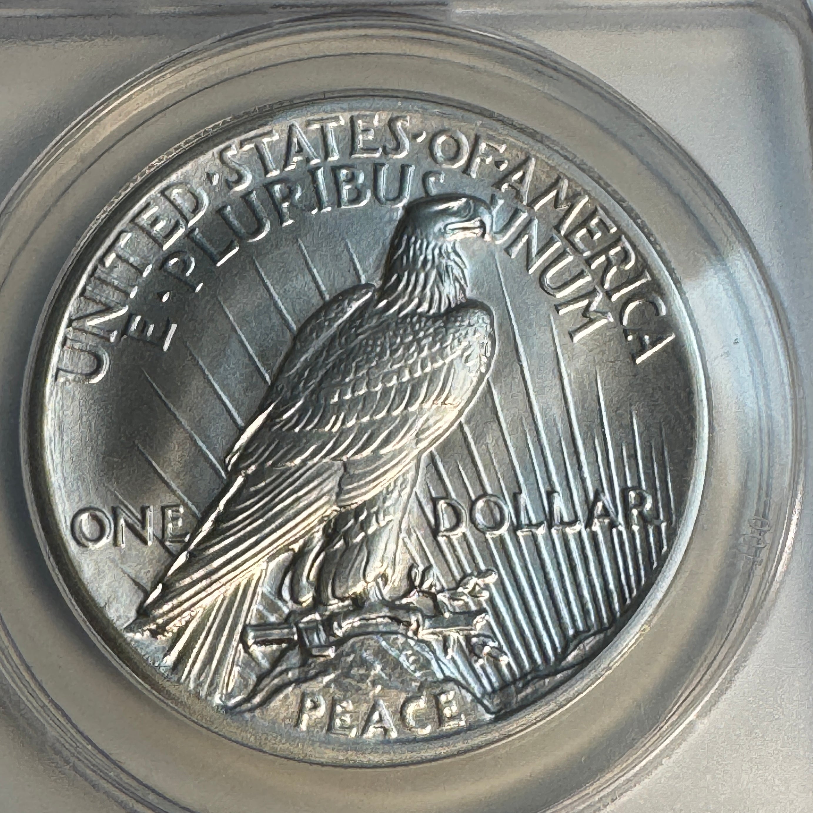 “1920” Daniel Carr Broken Sword Peace Dollar O/S on US Peace Dollar (1922-35) Host, ANACS MS-70