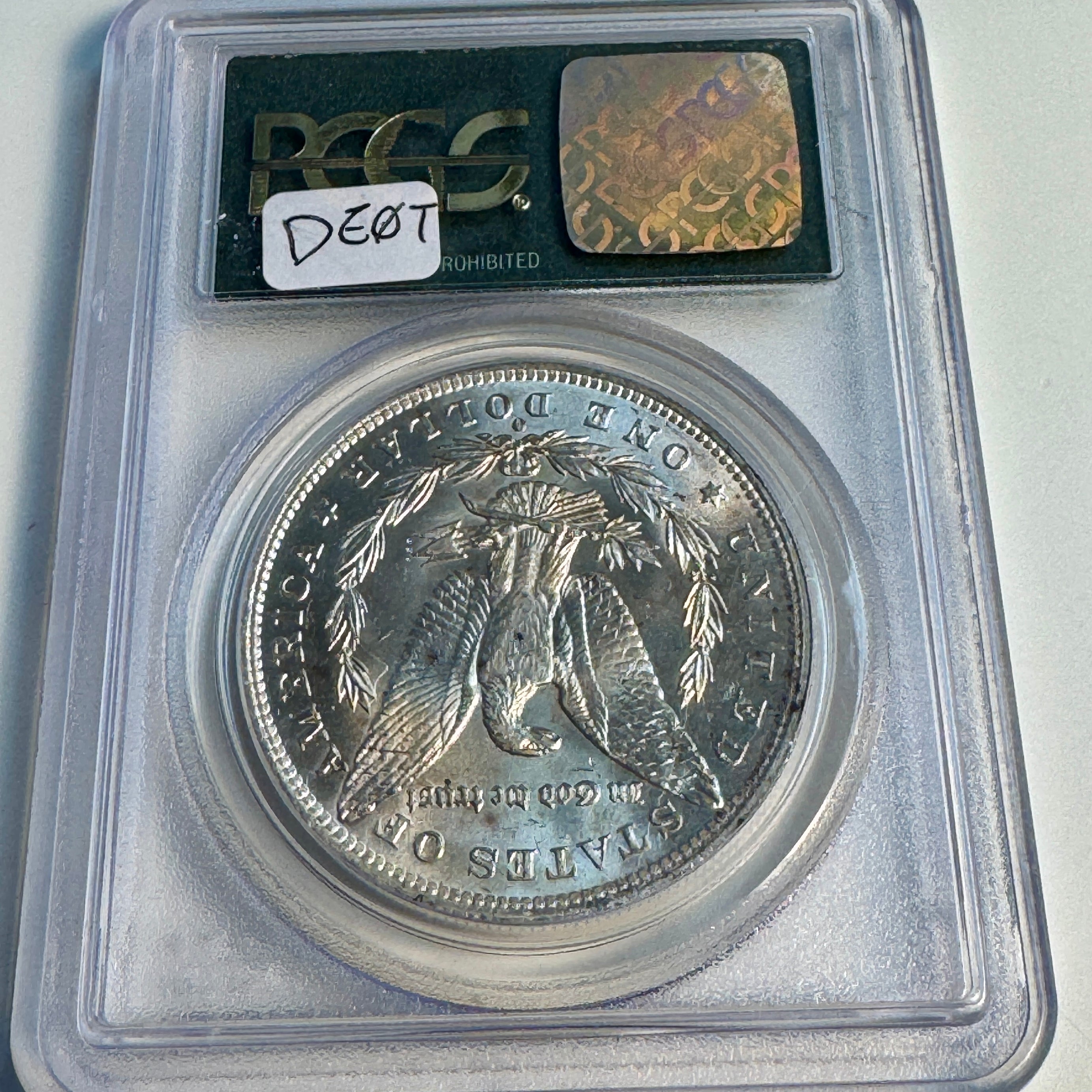 1885-O Morgan Silver Dollar, OGH PCGS MS-65