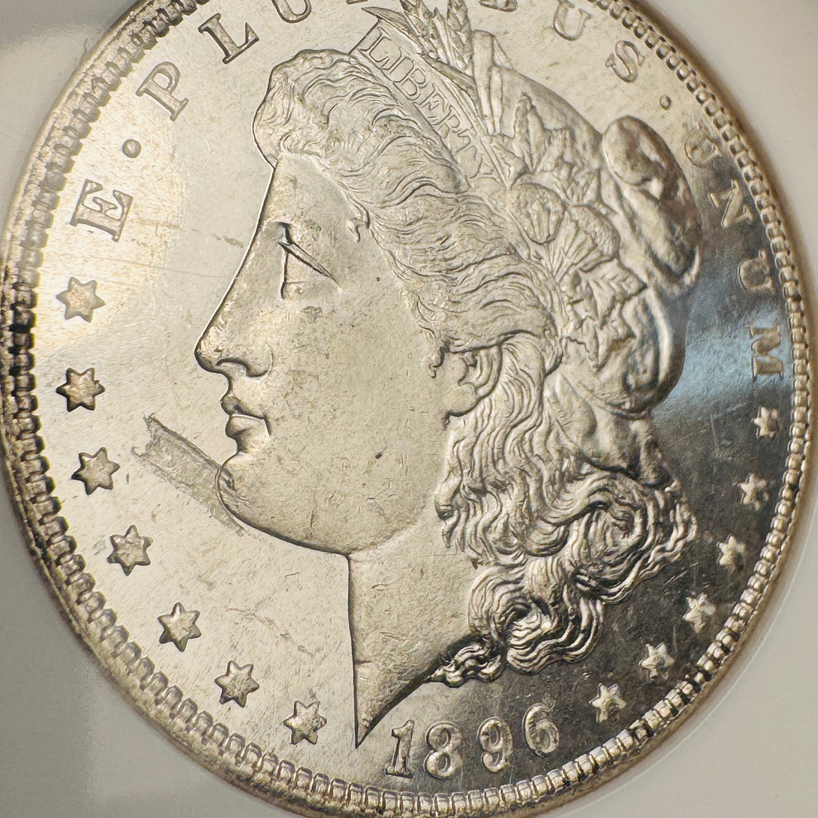 1896 (P) Mint Error Morgan Silver Dollar, Obverse Struck Thru (Debris), NGC MS-64 PL