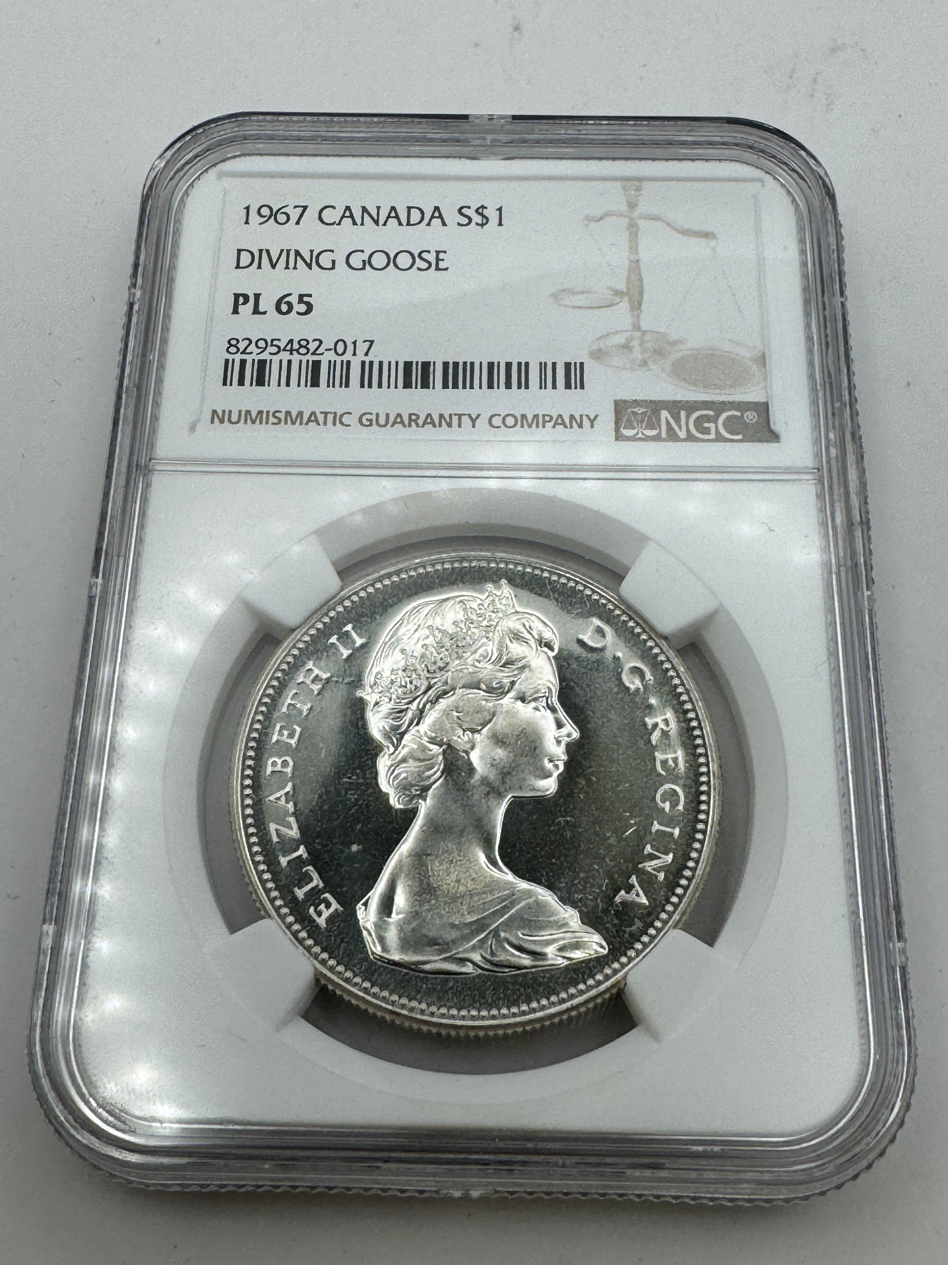 1967 Canada Silver Dollar, DIVING GOOSE 🪿rotation variety, NGC PL-65