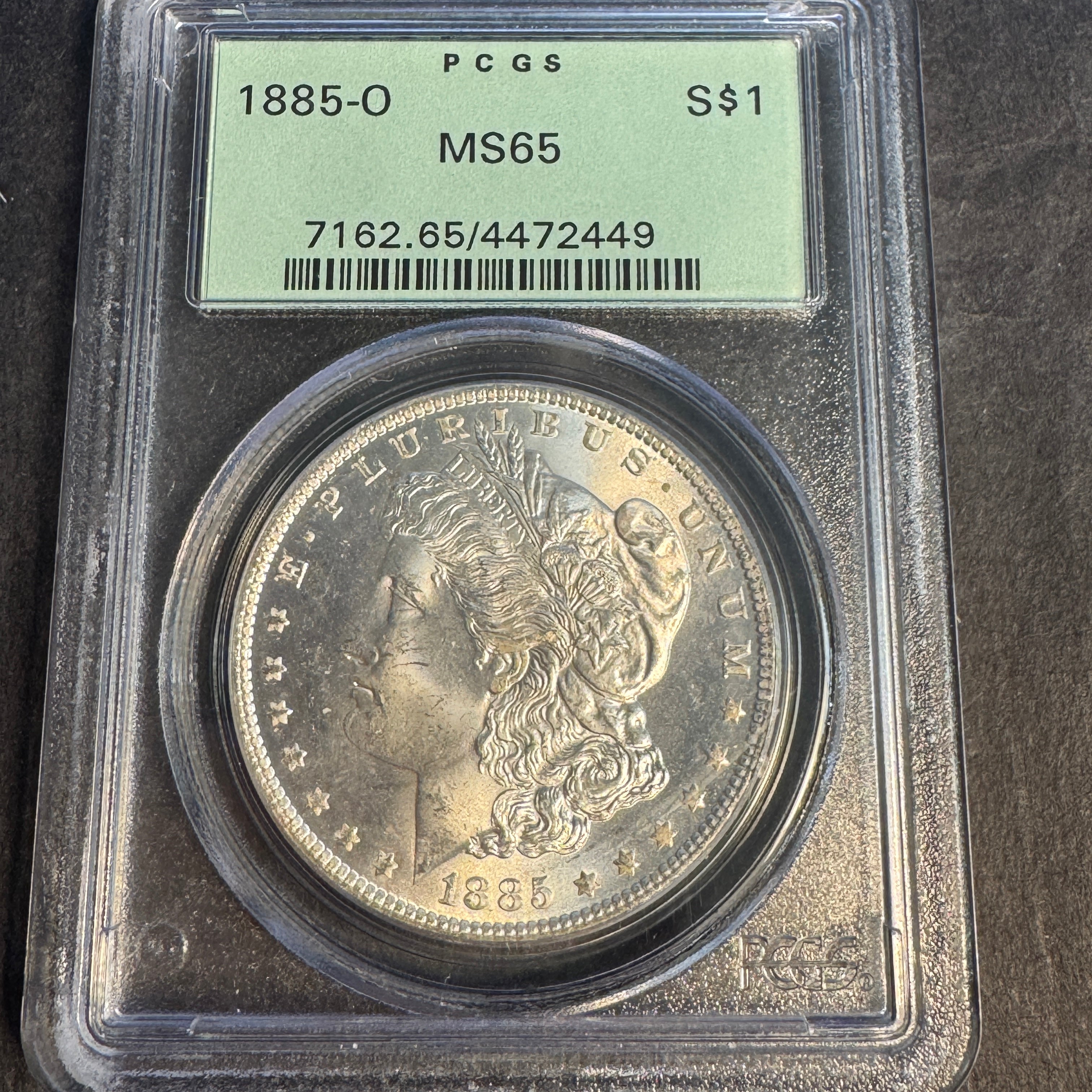 1885-O Morgan Silver Dollar $1, OGH PCGS MS-65