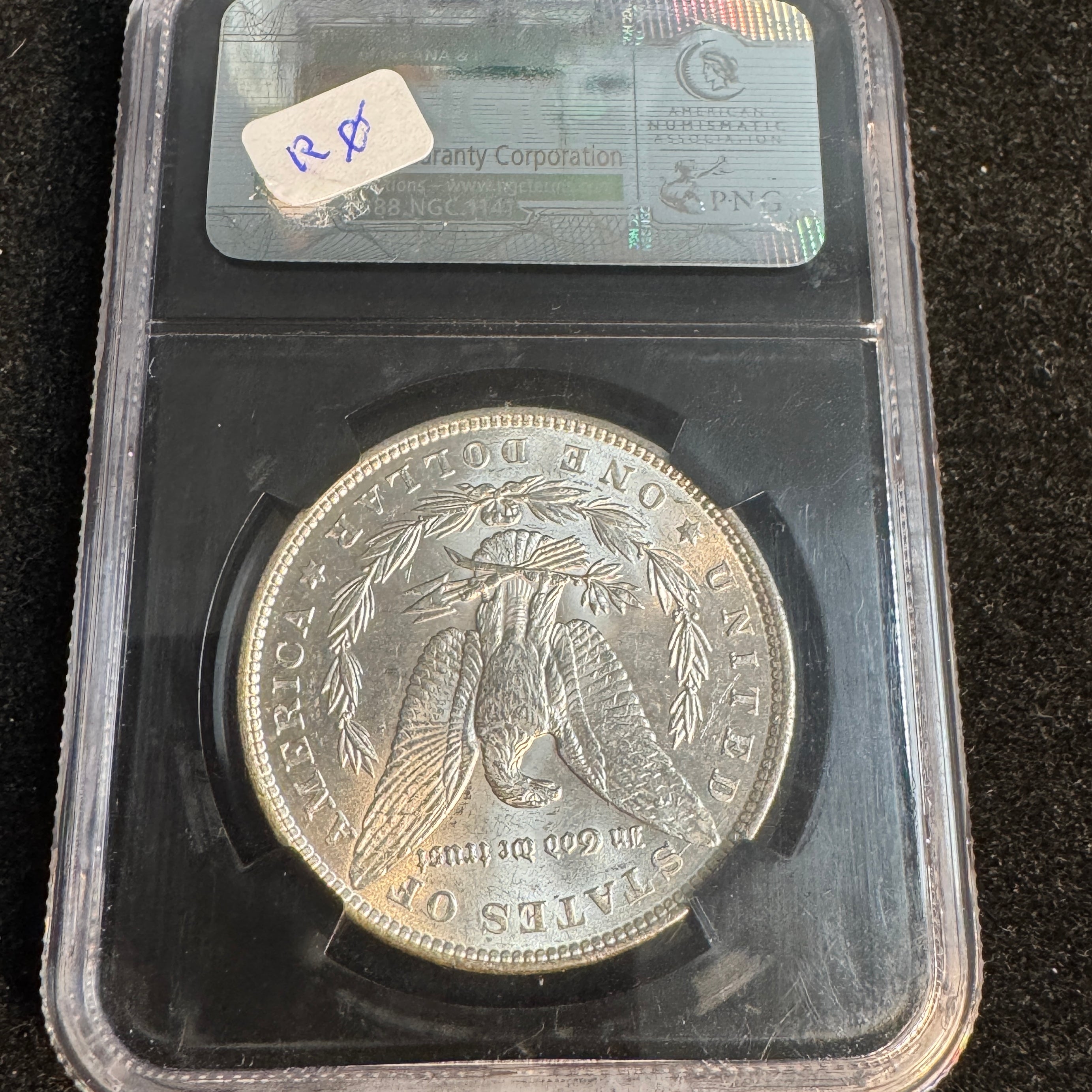 1886 Morgan Silver Dollar, NGC 25th Anniversary MS-62