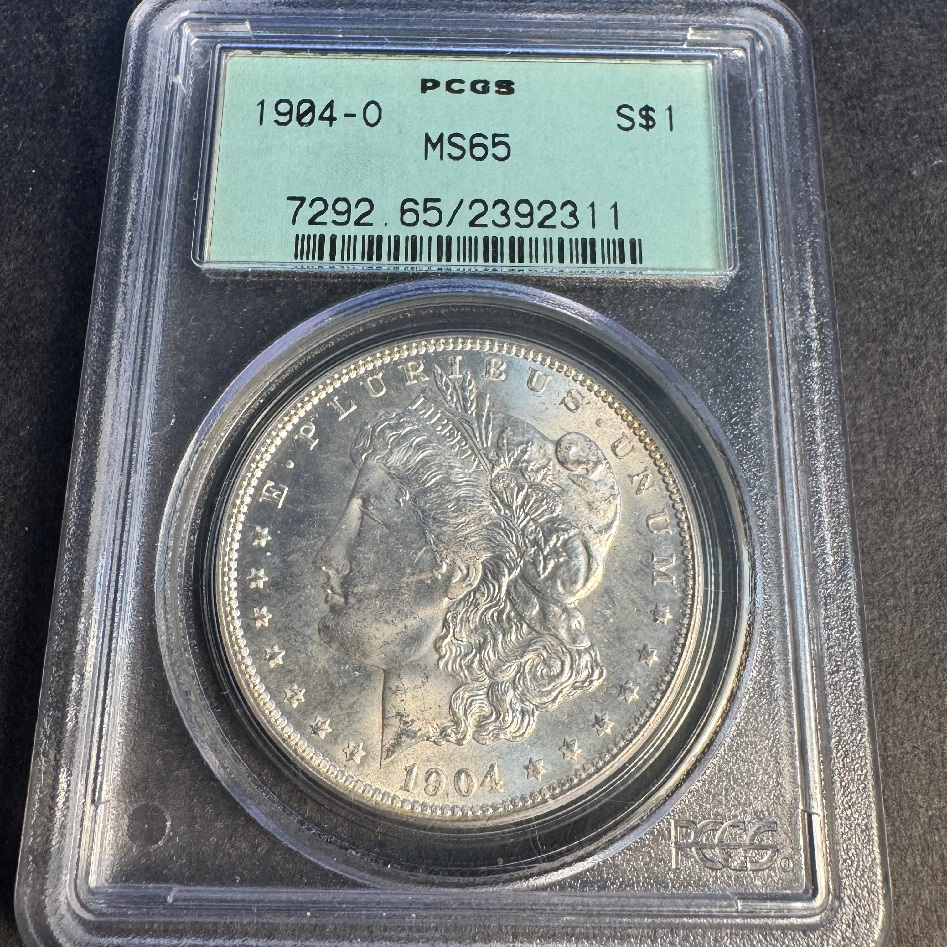 1904-O Morgan Silver Dollar $1, OGH PCGS MS-65