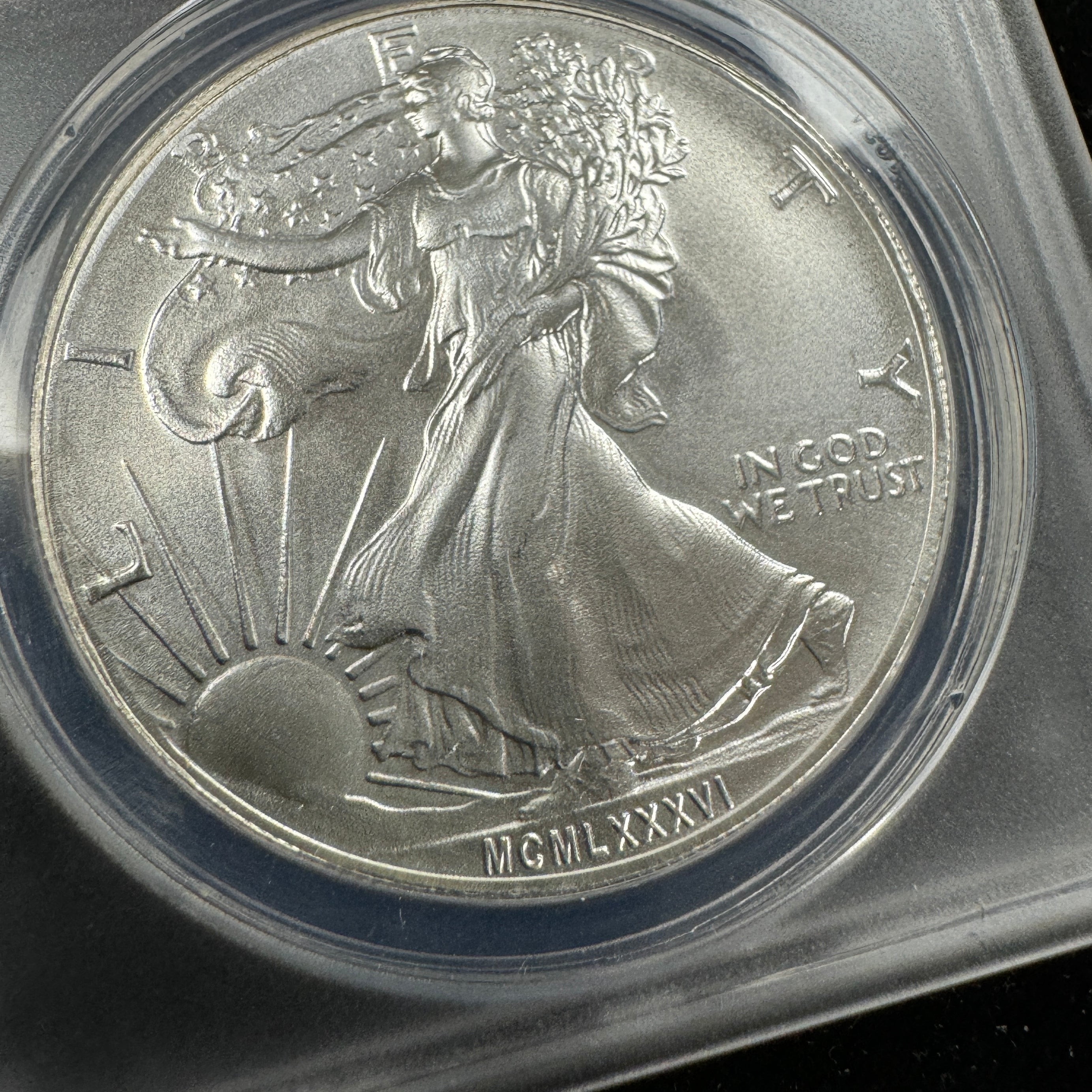 MCMLXXXVI (1986) Daniel Carr Overstruck ASE Design, US Silver Eagle, ANACS MS-69
