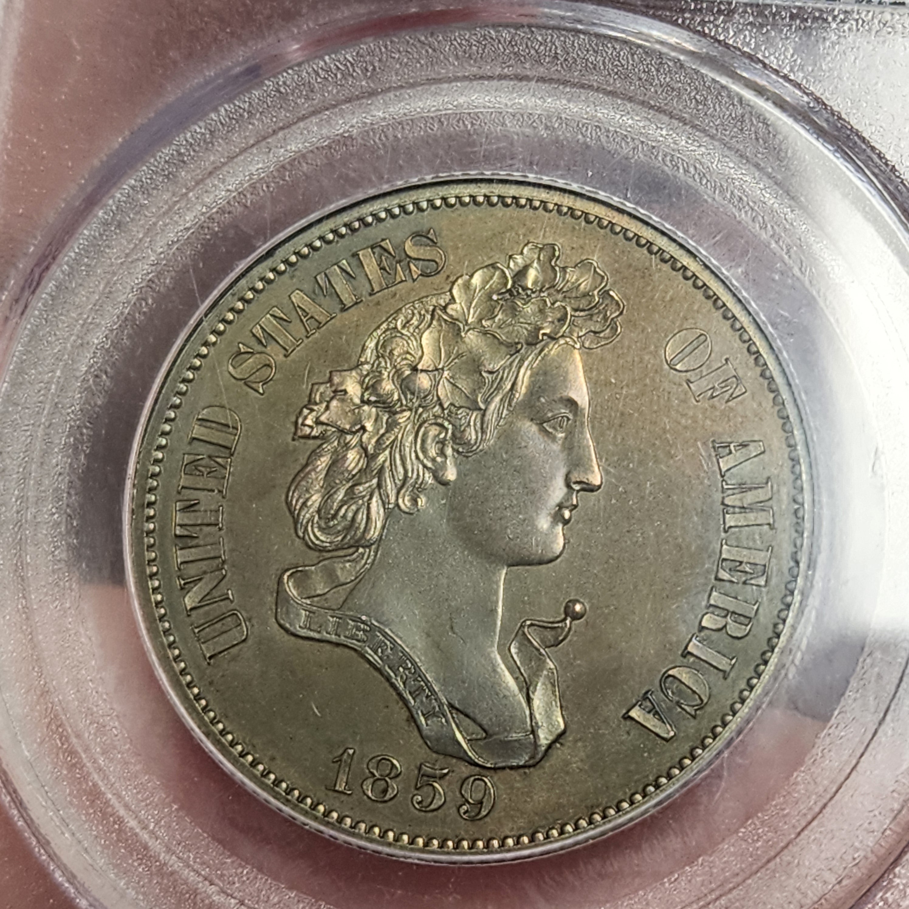 1859 50C J-242 PR64BN Pattern Toned